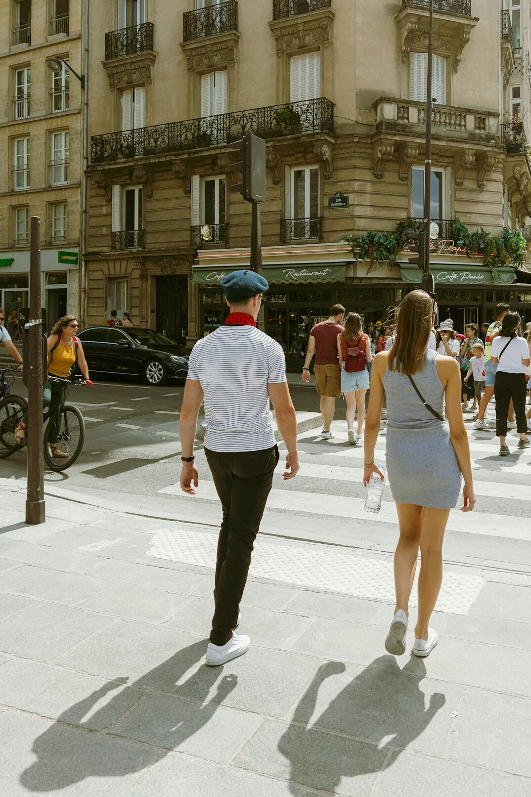 Stylish person walking on a European city street